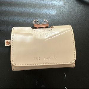 Ted Baker - light pink trifold wallet with glass crystal clasp